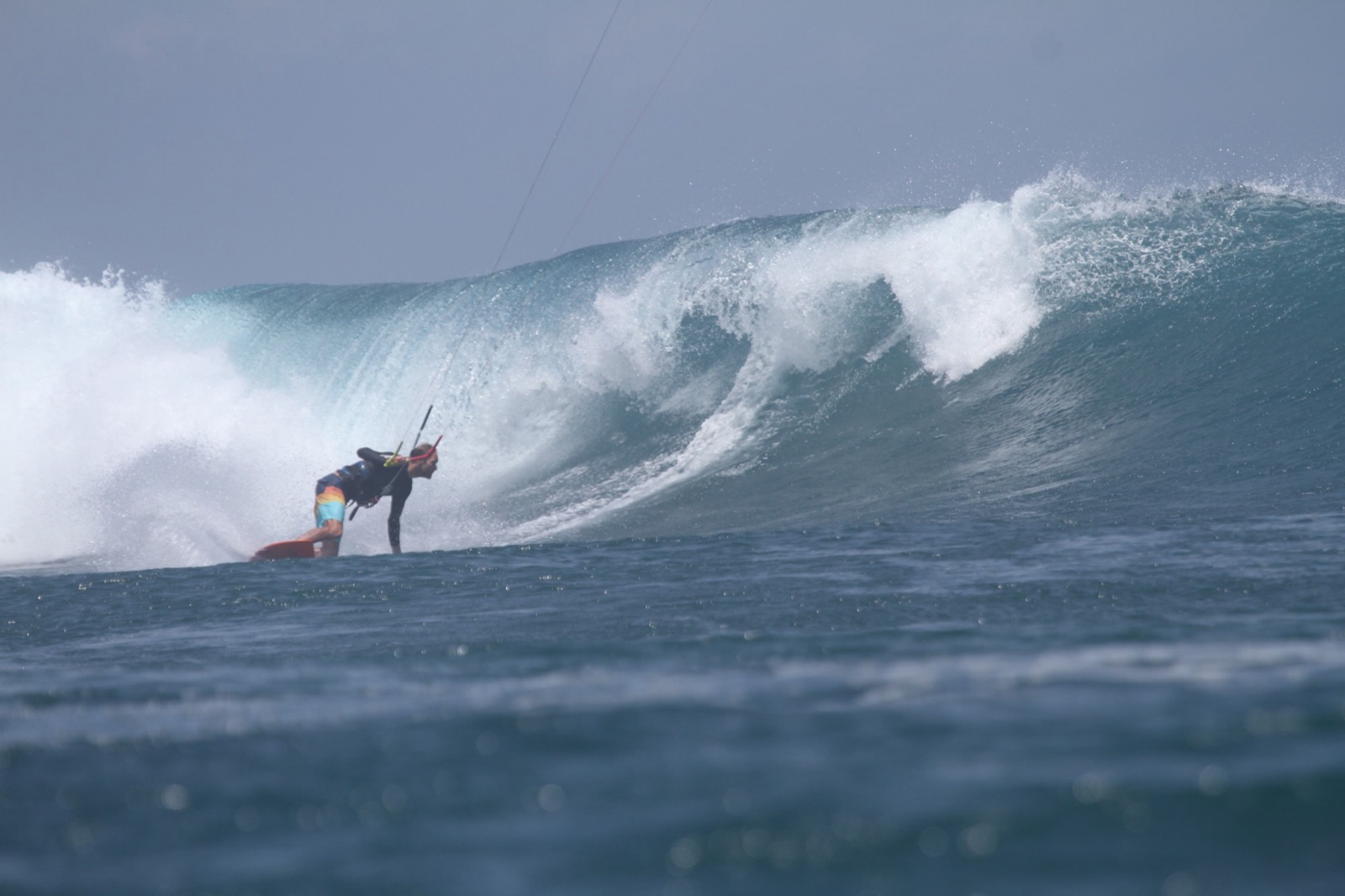 Reinoud riding strapless in the barrel kitesurfing at Lakey Beach